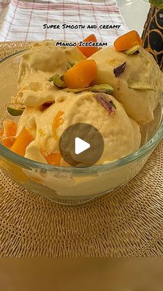 a glass bowl filled with food on top of a table