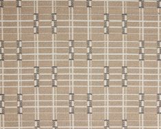 a beige and black checkered pattern on fabric