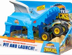 monster trucks pit and launch playset in its box