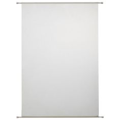 a white wall hanging on the side of a door