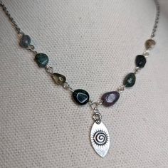 Spiral Charm Necklace With Moss Agate Accent Beads. Measures Approximately 16 Inches Long With A Lobster Clasp And 1.5 Inch Extension Chain. Stone Color And Shape Will Vary As These Are Made To Order Handmade Silver Agate Beaded Necklaces, Silver Beaded Agate Necklaces With Natural Stones, Silver Agate Round Beads Necklace, Silver Agate Necklace With Polished Beads, Silver Beaded Agate Necklace, Silver Agate Necklace With Round Beads, Silver Beaded Necklace With Agate, Handmade Spiral Silver Necklace, Bohemian Silver Agate Beaded Necklace