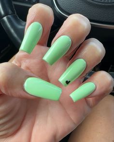 Summertime! Beautiful, mint, green coffin nails with black heart Mint Black Nails, Green Nails With Cross, Mint Coffin Acrylic Nails, Green Heart Nails, Mint Green Cow Print Nails, Mint Green And Black Nails