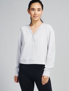 Varsity Henley Sweatshirt - tasc Performance (LightHeatherGray) Comfy Everyday Tops With Ribbed Cuffs, Comfy Tops With Ribbed Cuffs For Everyday, Comfy French Terry Tops With Ribbed Cuffs, Comfortable French Terry Tops With Ribbed Cuffs, Everyday French Terry Tops With Ribbed Cuffs, Casual French Terry Tops For Layering, Everyday French Terry Athleisure Sweatshirt, Cozy Fit French Terry Tops For Loungewear, Sporty French Terry Sweatshirt For Everyday