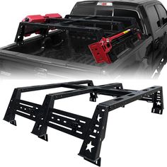 the truck bed rack is mounted to the back of a pickup truck with two red jacks on it