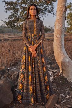 Navy blue maxi dress with ikat printed motifs, mirror embroidered detail.
Component: 1
Printed
Neckline: Round
Sleeve Length: Full
Fabric: Chanderi Silk
Color: Blue
Ikat print
Mirror work - Aza Fashions Kali Anarkali Dress, Maxi Dress Indian, Cape Set, Navy Blue Maxi Dress, Silk Ikat, Embroidered Maxi Dress, Ikat Print, Indian Fashion Designers, Anarkali Dress