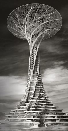 a very tall structure with many stairs and trees on it's sides in black and white