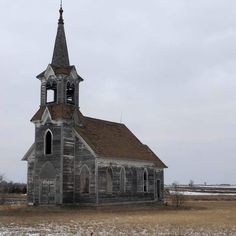 an old wooden church in the middle of nowhere