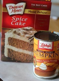 a can of pumpkin cake next to a box of spice cake