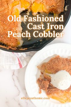 an old fashioned cast iron peach cobbler on a white plate next to a skillet