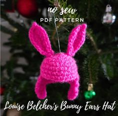 a pink crocheted bunny ear hat hanging from a christmas tree with the words, no sew pattern