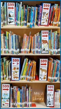 the bookshelf is full of children's books for sale at the library