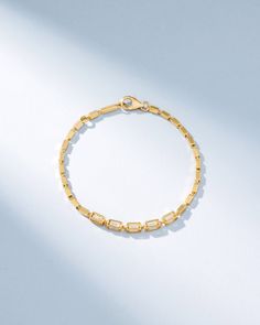 Crafted with solid 18-karat gold, this block-chain bracelet presents a symphony of four-sided links. It features five links set with baguette white diamonds on all four sides. The medium, block-chains add a contemporary edge to the timeless design making it perfect for casual or evening wear. Details 18k yellow gold, rose gold or white gold 2.05 carats of baguette white diamonds Measures 7" inches in length, adjustable at 6.5" inches Model styling 7" bracelet in yellow gold, first from the right Block Chain, White Rose Gold, White Diamonds, Gold Rose, Evening Wear, Diamond White, Chain Bracelet, Timeless Design, Fashion Models