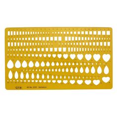 a yellow metal plate with hearts on it