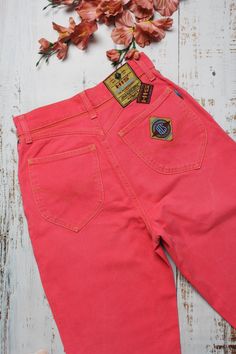 Vintage coral pink Henry I. Siegel jeans for women. Beautiful and unique color, very high rise and tapered leg. Please check the measurements below. Material: 100% cotton (they do not stretch) Overall vintage condition: 9/10 (light discoloration in the back - shown in the 6th photo) Size: XS / EU size 36/29 on the tag Waist: 26,4 inch / 67 cm Hips: 38,6 inch / 98 cm Rise: 11,4 inch / 29 cm Thigh: 22,85 inch / 58 cm Inner length: 29,5 inch /75 cm Outer length: 40,15 inch / 102 cm Leg opening: 13 inch / 33 cm More jeans from my shop: https://www.etsy.com/shop/sisuvintagestore?section_id=21302536 --- SHIPPING --- Every parcel is shipped as priority with tracking number. Shipping takes to 2-15 working days. Please allow to two working days for shipping after purchase. My second shop with rewor Reworked Denim, Pink Jeans, Photo Size, Womens Jeans, Jeans For Women, Denim Outfit, Coral Pink, Unique Colors, Poland