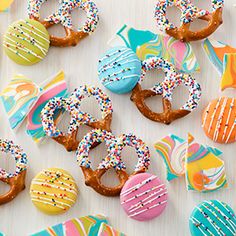 decorated donuts and pretzels on a table