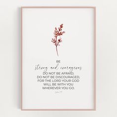 a pink and white print with the words be strong and courageous on it, in a gold frame