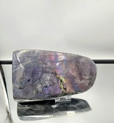 Extra Large Purple Labradorite Crystal – Fully Polished with Full Flash This stunning Extra Large Purple Labradorite Crystal is a beautiful centerpiece for any collection or home decor. Expertly hand-polished to reveal its captivating full flash of...