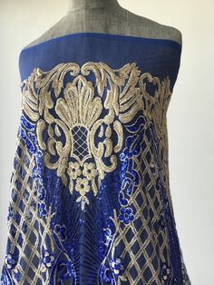 Gold and cobalt blue sequins lace fabric Rich fabric for evening formal gown Width is 135 cm Price is for one yard all order over quantity 1 will be in a continuous length Blue Party Dress With Lace Work, Blue Lace Work Party Dress, Blue Lace Party Dress, Blue Embellished Sequin Fabric For Prom, Embellished Blue Sequin Fabric For Prom, Blue Embellished Fitted Embroidered Fabric, Glamorous Blue Sequin Fabric For Festive Occasions, Glamorous Blue Embellished Sequin Fabric, Fitted Blue Embellished Embroidered Fabric