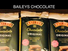 three bags of bailey's chocolate are sitting on a shelf next to each other