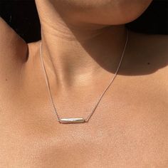 Modern and Minimal, our Maris bar necklace is the perfect accent to your everyday look. Crafted with a rectangle shaped and iridescent  pearl, this necklace is gorgeous on its own or as a layering necklace.  The sterling silver chain measures 14 in with a 2 inch extender which allows you to create the perfect fit with the pearl resting just below your collar bones.  Handcrafted in Seattle Hypoallergenic Sterling silver and fresh water pearl. Pearl Bar Necklace, Iridescent Pearl, September Birthstone Jewelry, August Birthstone Jewelry, July Birthstone Jewelry, Casting Jewelry, Pearl Jewellery Earrings, Jewelry Ring Box, Layering Necklace