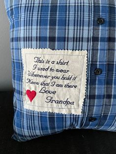 a blue and white plaid pillow with an embroidered quote on the front that says, trust in a bird i used to exact whenever