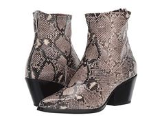 Dolce Vita Shanta (Black/White Snake Print Stella) Women's Shoes Get your look rough and rowdy in the Dolce Vita Shanta booties. Western-inspired ankle boots feature a leather and stretch textile upper. Back heel zipper closure. Pointed-toe silhouette. Textile lining. Lightly-padded fixed footbed. Stacked heel. Synthetic outsole. Imported. Measurements: Heel Height: 2 1 4 in Weight: 13 oz Circumference: 8 1 2 in Shaft: 6 1 2 #DolceVita #Shoes #ClosedFootwear #GeneralClosedFootwear #Animal Print White Snake, Women Fashion Edgy, Womens Fashion Edgy, Black Shoes Women, Blazer Fashion, Snake Print, Stacked Heel, Fashion Boots, Wedge Boot