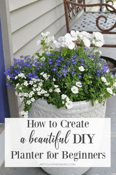 a potted planter filled with blue and white flowers