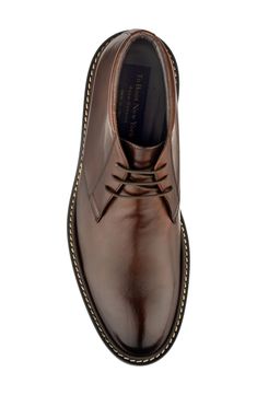 A burnished leather upper and streamlined profile offer timeless sophistication on a luxe chukka boot grounded by a cushioned footbed and rubber lug sole. Lace-up style Cushioned footbed with arch support Leather upper and lining/rubber sole Made in Italy Formal High-top Chukka Boots With Rubber Sole, Semi-formal Chukka Boots With Leather Lining And Plain Toe, Semi-formal Chukka Boots With Leather Lining, Classic Chukka Boots With Rubber Sole For Business Casual, Classic Formal Chukka Boots With Leather Footbed, Formal Chukka Boots With Goodyear Welt Construction, Classic Chukka Boots With Leather Sole For Business Casual, Formal Goodyear Welt Chukka Boots, Formal Ankle Chukka Boots With Goodyear Welt