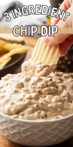 a hand dipping chips into a bowl of dip with the words 3 ingredient chip dip above it