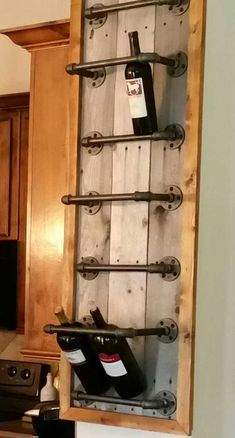 the wine rack is made out of wooden planks