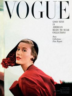 a magazine cover with a woman wearing a red dress and flower in her hair on the cover