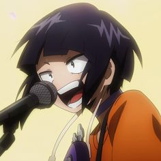 an anime character singing into a microphone