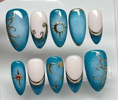 Blue Celestial Nails, Nails Art Bleu, Galaxy Acrylic Nails, Egyptian Nail Art, Acrylic Nails Gold, Celestial Nail Art, Blue And Gold Nails, Egyptian Nails, Nail Art Blue