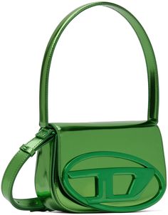 Patent leather shoulder bag in metallic green. · Fixed shoulder strap · Adjustable and detachable crossbody strap · Logo hardware at face · Magnetic press-stud flap · Patch pocket at two-compartment interior · Logo-woven moiré lining · H5 x W7.5 x D2.25 Supplier color: Green Luxury Green Bag With Logo Hardware, Tan Top Handle Shoulder Bag With Logo Hardware, Modern Green Shoulder Bag With Branded Hardware, Designer Green Shoulder Bag With Adjustable Strap, Modern Tan Shoulder Bag With Logo Hardware, Modern Tan Bags With Logo Hardware, Designer Tan Shoulder Bag With Logo Hardware, Tan Shoulder Bag With Double Handle And Logo Hardware, Evening Green Shoulder Bag With Silver-tone Hardware