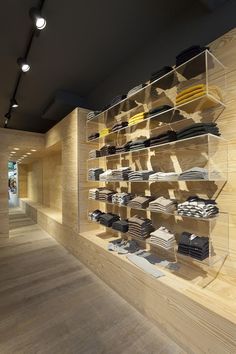 the shelves are filled with books and other items on display at the store's interior