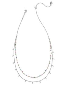 Go all in on the minimal aesthetic with the Eve Silver Multi Strand Necklace in White Mix, featuring petite cultured freshwater pearls and layered chains. It’s a chic yet simple way to achieve effortless style status—what's there to say no to? Rhodium Over Brass White Mix Lobster Clasp W/ Single Adjustable Slider Bead 19" Chain By: Kendra Scott White Minimalist Layered Necklace With Adjustable Chain, White Multi-strand Jewelry With Delicate Chain, White Multi-strand Delicate Chain Jewelry, White Double Strand Jewelry With Double Chain, White Double Strand Layered Necklace With Delicate Chain, White Double Strand Chain Jewelry, White Double Strand Layered Jewelry, White Layered Double Strand Jewelry, White Multi-strand Layered Necklace With Adjustable Chain