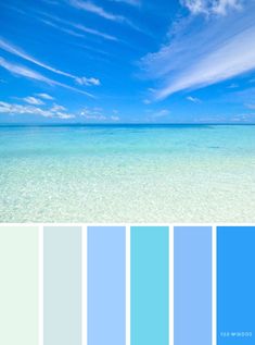 blue and green color palette with the ocean in the background, along with white clouds