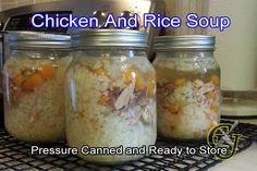 three jars filled with food sitting on top of a counter