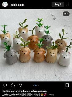 a group of small ceramic animals sitting next to each other