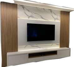 an entertainment center with a flat screen tv mounted on the wall