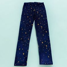 These Stars Print Pants Are A Stylish And Comfortable Addition To Any Wardrobe. The Pants Feature A Unique And Eye-Catching Design With A Combination Of Navy Blue And Yellow Colors, Along With A Touch Of Black. The Stars Pattern Adds A Playful And Feminine Touch To The Outfit. These Pants Are Perfect For Casual Wear Or As A Statement Piece For A More Formal Occasion. The Stretchy Fabric Ensures A Comfortable Fit, Making Them Suitable For Various Body Types And Occasions. Pair Them With A Matchin Star Pj Pants, Star Pjs, Star Print Pants, Navy Blue And Yellow, Star Clothing, Stars Pattern, Cute Leggings, Stretchy Leggings, Blue Stars