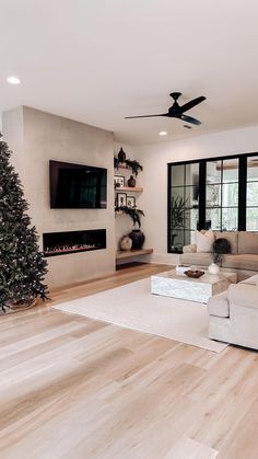 the living room is clean and ready to be used for holiday decorations, including a christmas tree