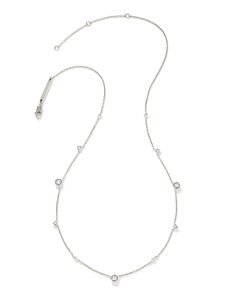 A delicate necklace adorned with moments of subtle sparkle. The Davie Sterling Silver Trio Strand Necklace in White Sapphire is an elevated layering piece designed to shine for years to come, featuring a minimalist design that’s perfect for everyday wear. Minimalist Single Strand White Gold Diamond Necklace, Everyday White Gold Diamond Necklace With Delicate Chain, Modern White Gold Diamond Necklace With Delicate Chain, Minimalist White Gold Single Strand Diamond Necklace, Timeless Silver Solitaire Necklace With Delicate Chain, Minimalist Jewelry With Satellite Chain For Anniversary, Minimalist White Gold Necklace With Satellite Chain, Elegant Station Necklace With Satellite Chain, Minimalist Sterling Silver Station Necklace