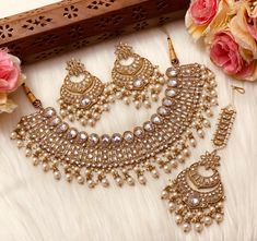 Gorgeous Sabyasachi tyaanai inspired Mirror Choker that is high in demand for the wedding season comes with matching earrings and tikka. The bollywood style modern choker is like a necklace that falls right under the neck and is very versatile. There is an adjustable drawstring that makes the necklace adjustable according to preference and the tikka and jhumka can be work seperately as well. Lightweight shisha work along with beads to add a pop of bright color. Free Shipping and Fast shipping - Indian Wedding Jewelry Sets, Beautiful Chokers, Fancy Jewellery Designs, Indian Necklace, Jewelry Mirror, Bollywood Style, Bollywood Jewelry, Pakistani Jewelry, Choker Set