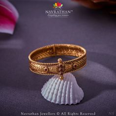 Embrace the timeless charm of antique heritage jewels, crafted delicately on 22k gold, for an exquisite touch of sophistication.  We are open from 10 am to 8 pm  𝐋 𝐨 𝐜 𝐚 𝐭 𝐢 𝐨 𝐧 : M.G. ROAD, JAYANAGAR, RAJAJINAGAR, C T STREET  For Enquiry: +91 9108701007  #navrathan #navrathanjewellers #thisisnavrathan #jewelry #jewellerydesign #JewelleryAddicts #jewellerylovers #expressyourself #jewelryaddict #antiquejewellery #antiqebeauty #timelesstreasures #luxuryjewellery  #bridaljewellery #antiquejewellery Delicate Gold Jewelry, Antique Necklaces Design, Gold Bangles For Women, Antique Necklaces, New Gold Jewellery Designs, Gold Bangle Set, Indian Jewellery Design Earrings, Bangles Design, Black Beaded Jewelry