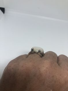 Mother of Pearl set in 925 Sterling Silver Marcasite ring I have size 5.75 Can be re sized for you, my jeweler would charge $10-$20 All rings are shipped in a nice gift box. Check out our over a THOUSAND great reviews Engraving is $4 per letter and is not always perfect depending on the piece. It can take a few days if the jeweler is busy. This is payable to Paypal Judithsltd@gmail.com Marcasite Ring, Sterling Silver Marcasite, Pearl Set, Mother Of Pearl, Statement Rings, Best Gifts, Gift Box, 925 Sterling Silver, Sterling Silver