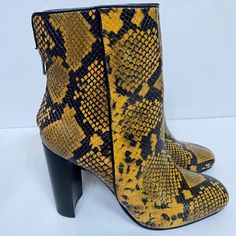 Aqua Soren Brown Leather Ankle Boots Multi Color Shoes 8m Black And Yellow Ankle Booties Heel About 4’ Side Zipper Animal Printed Boots Size 8 Leather New Without Box Bold Fall Ankle Boot Heels, Yellow Round Toe Heels For Fall, Casual Yellow Boots With Reinforced Heel, Casual Yellow Heels For Fall, Yellow Ankle-high Spring Boots, Yellow Leather Ankle-high Boots, Yellow Round Toe Heeled Boots For Fall, Yellow High Heel Boots For Fall, Yellow Ankle Boots For Spring