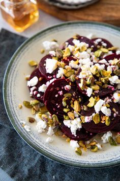 beets, goat cheese and pistachio salad on a plate