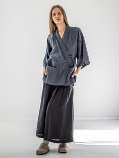 "Minimalist linen kimono jacket with raw-edge details. If you're interested in a longer medium-weight option with belt, check our jacket FUDO. STYLE DETAILS * Loose fit * Kimono sleeves & collar * Raw-edge details on the collar, sleeves & pockets * Patch pockets * Side slits * Tie strings inside and outside for better fit * French seams inside * Made from heavy-weight linen SIZES & COLORS IN PICTURES * Model 1 wears size M in color Dark Grey Heavy. She is 176 cm (5'9\"). Bust - 81 cm (32\"), waist - 67 cm (26\"), hips - 90 cm (35\").  * Model 2 wears size m in color Dark Grey Heavy. She is 178 cm (5'10\"). Bust - 85 cm (33\"), waist - 63 cm (25\"), hips - 86 cm (34\"). NOTES ON SIZING & COLORS * Please note that linen shrinkage during the softening process cannot be predicted precisely. Th Casual Linen Kimono With Kimono Sleeves, Linen Kimono With Relaxed Fit, Casual Linen Kimono With Relaxed Fit, Casual Linen Kimono For Spring, Spring Casual Linen Kimono, Spring Linen Outerwear With Kimono Sleeves, Fall Long Sleeve Linen Kimono, Kimono Linen, Linen Jackets Women