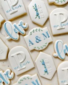 decorated cookies are arranged on a table